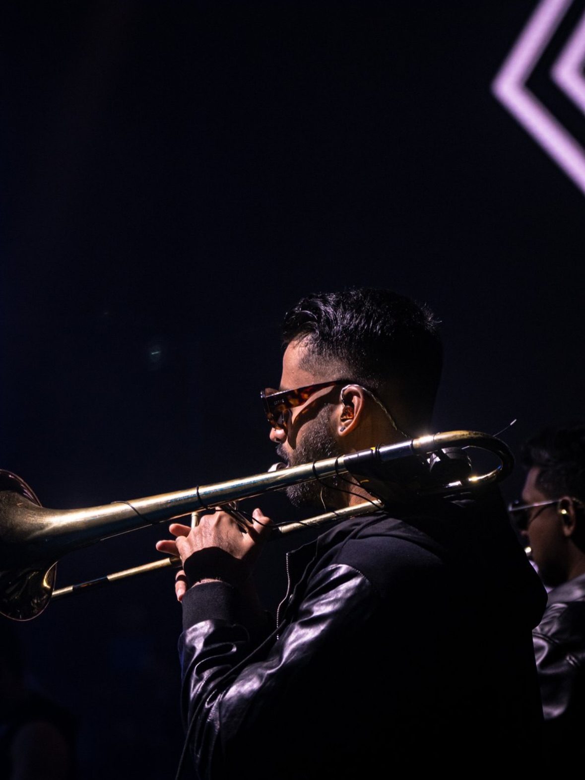 RJT playing trombone close-up